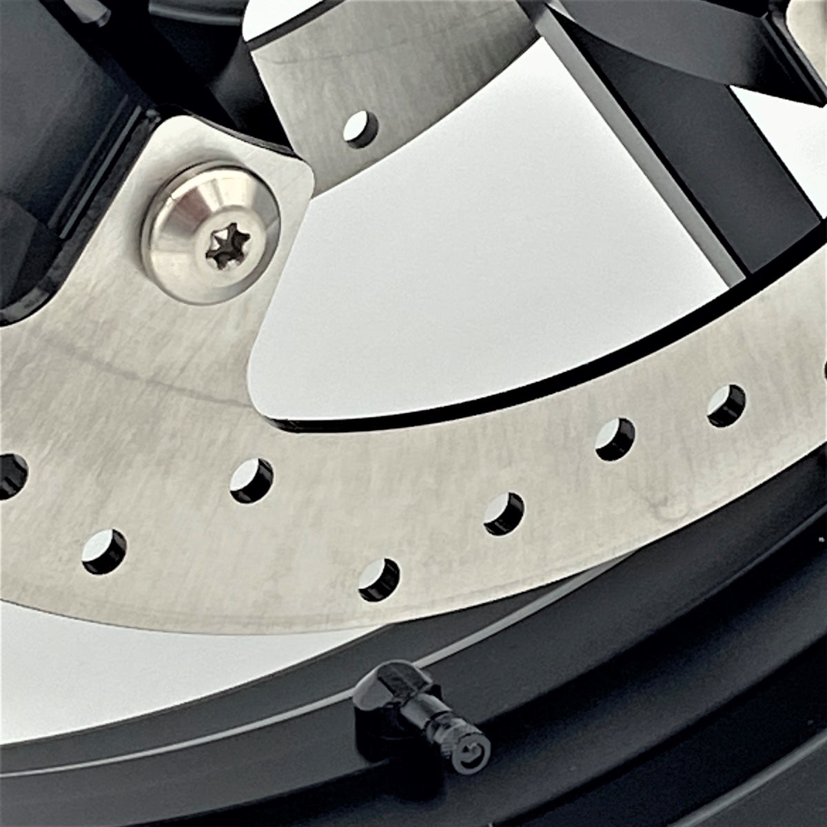 GeezerEngineering 90 degree angled valve stem makes checking the tire pressure easy for Harley